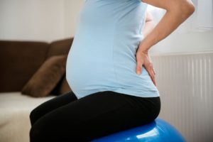 14 недель беременности болит поясница