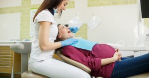 Удаление зуба при беременности в первом триместре