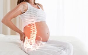 Болит спина на 32 неделе беременности